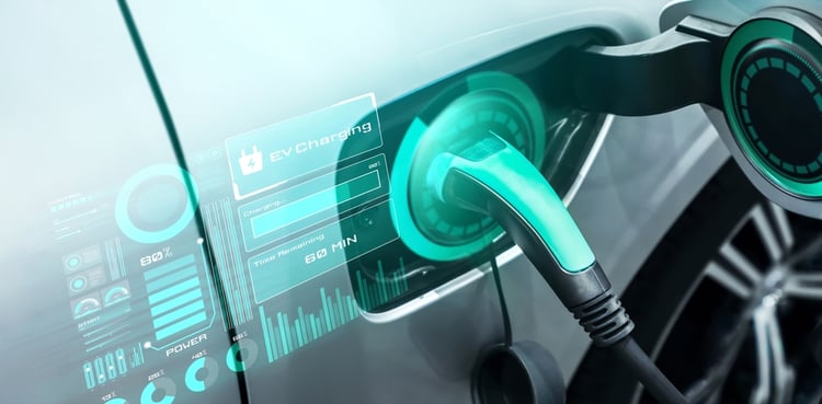 A futuristic photo of a charging cable connected to an electric car. An infographic shows that the car is charging.